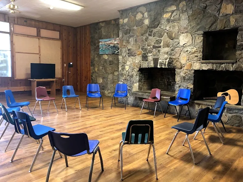 Circle of chairs in a cozy meeting room at Cornerstone of Rhinebeck NY detox center in Albany.